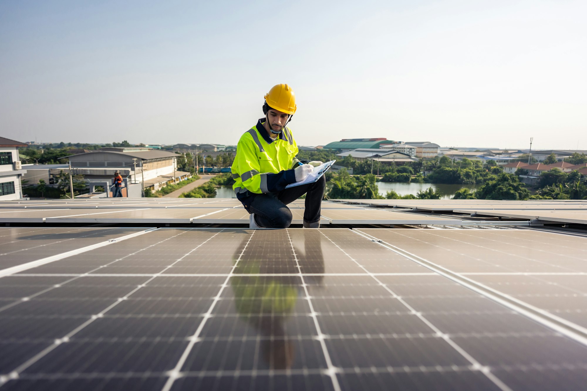 Professional engineer work to maintenance of photovoltaic panel system.